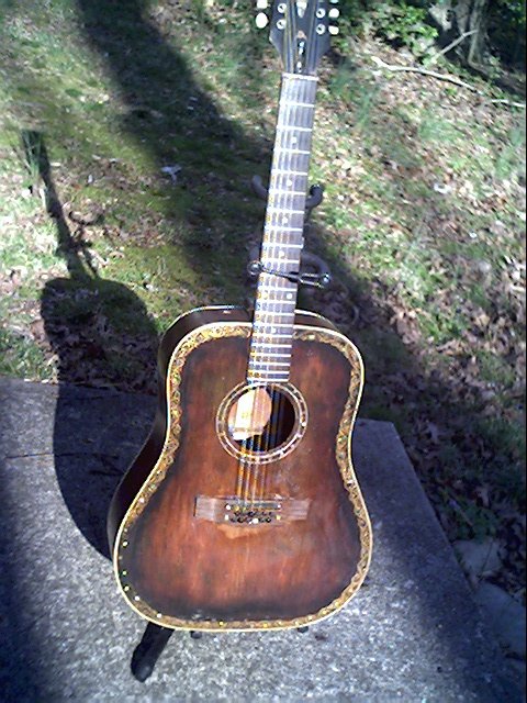 image title is /guitars/Gibson 12-string front view After Bridgeplate repair 2